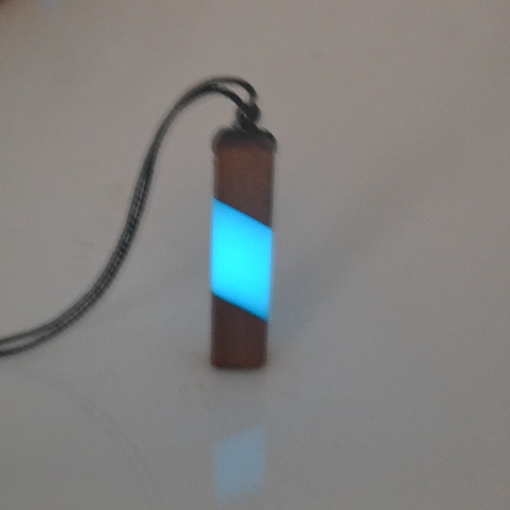 luminous necklace pendant at night
