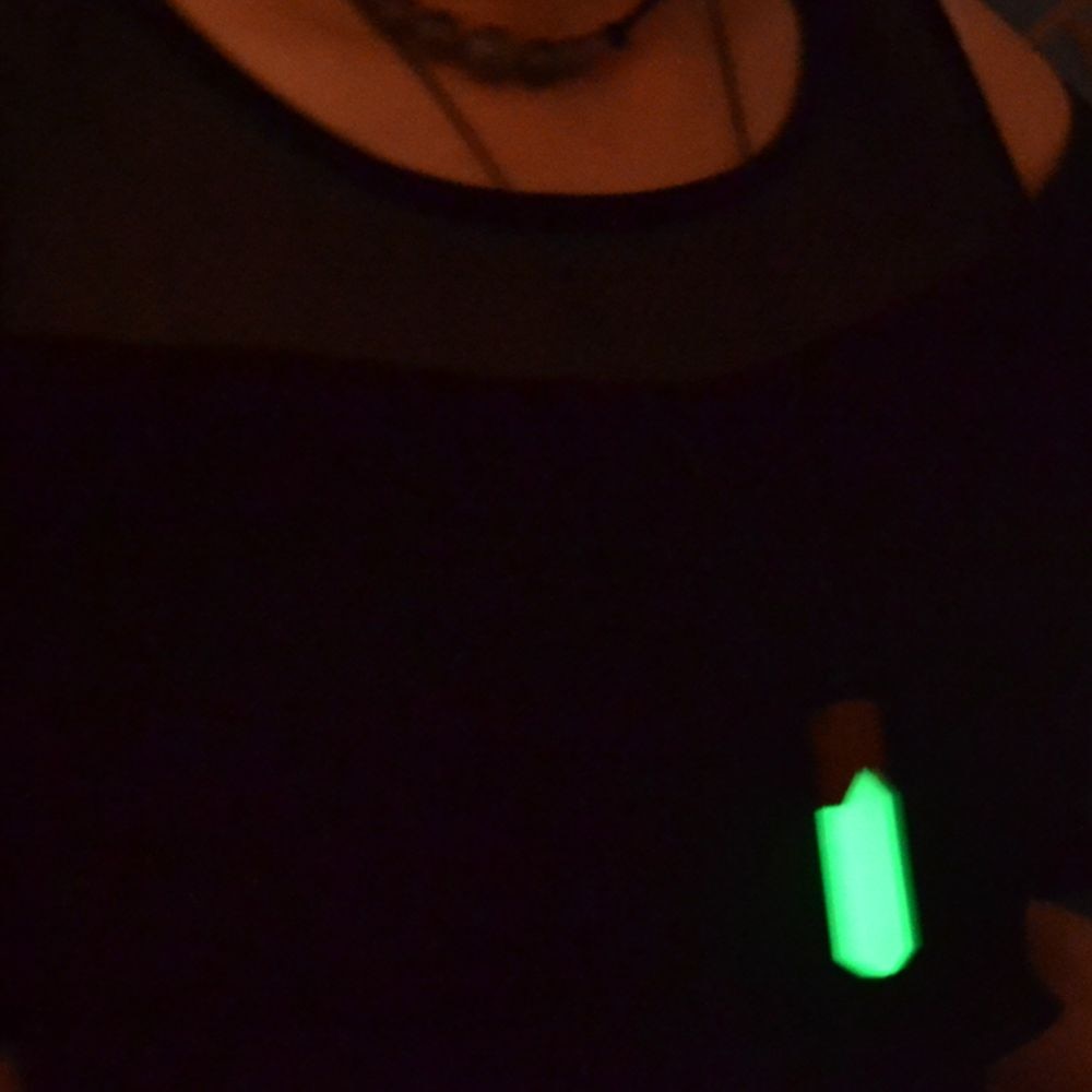 luminous necklace pendant at night