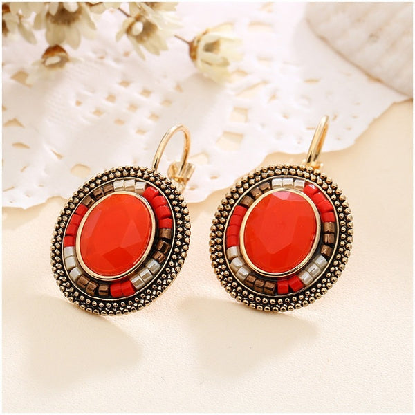 Pendientes de clip con cuentas de arroz de cristal ovalado estilo retro bohemio