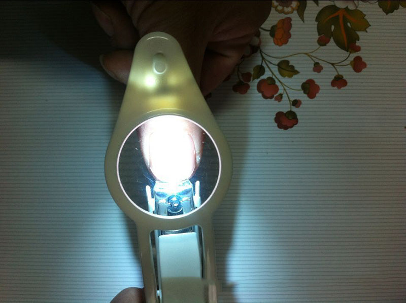 Lighted Nail Clipper With Magnifier