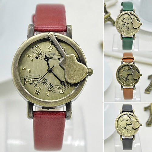 Reloj de pulsera de cuarzo informal con esfera de notas y puntero de guitarra vintage sin número