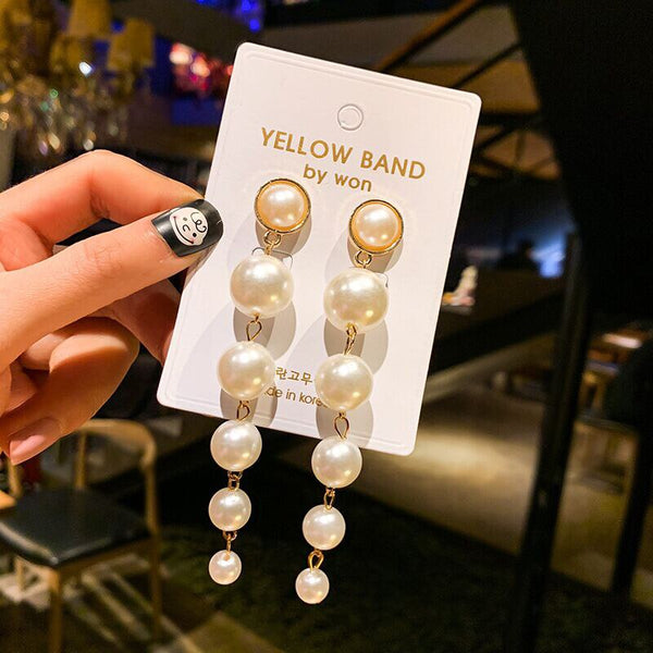 Elegantes pendientes largos de clip con perla simulada sin perforación