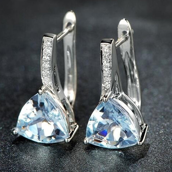 Pendientes de botón de plata con forma de corazón y piedras azules para mujer