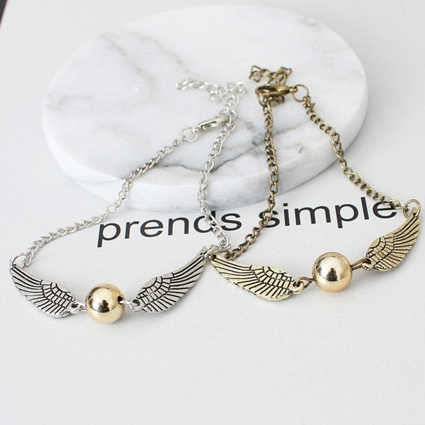 Pulsera de bolsillo de moda con snitch dorada