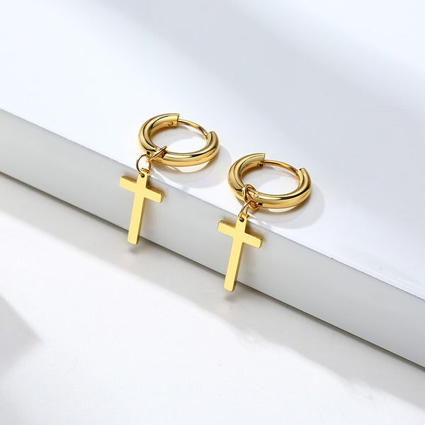 Delicados pendientes colgantes minimalistas en forma de cruz de color dorado