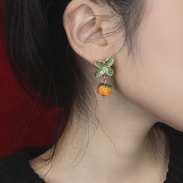 Pendientes creativos con forma de hoja y flor color naranja caqui para mujer