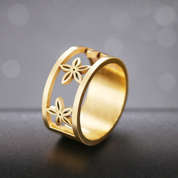Anillo de acero inoxidable con diseño de flores huecas para mujer