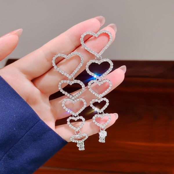 Pendientes colgantes vintage de corazón hueco y brillante