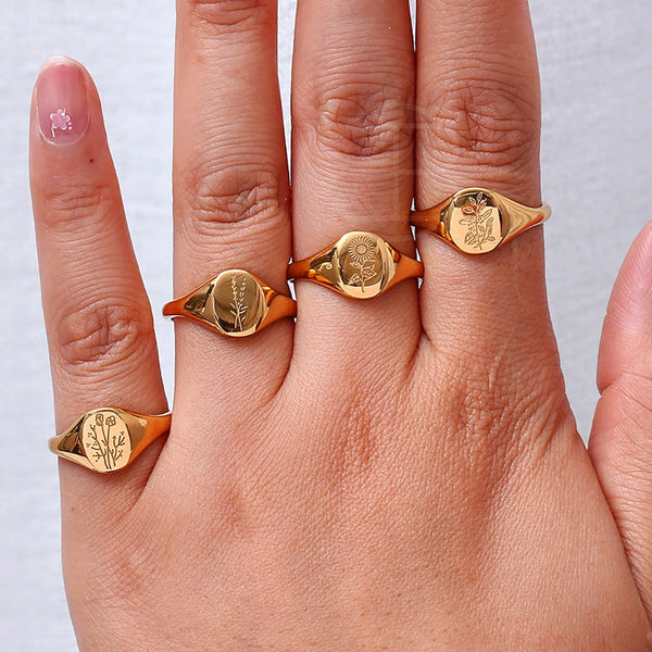 Anillos de sello de girasol y lavanda bañados en oro de 18 quilates