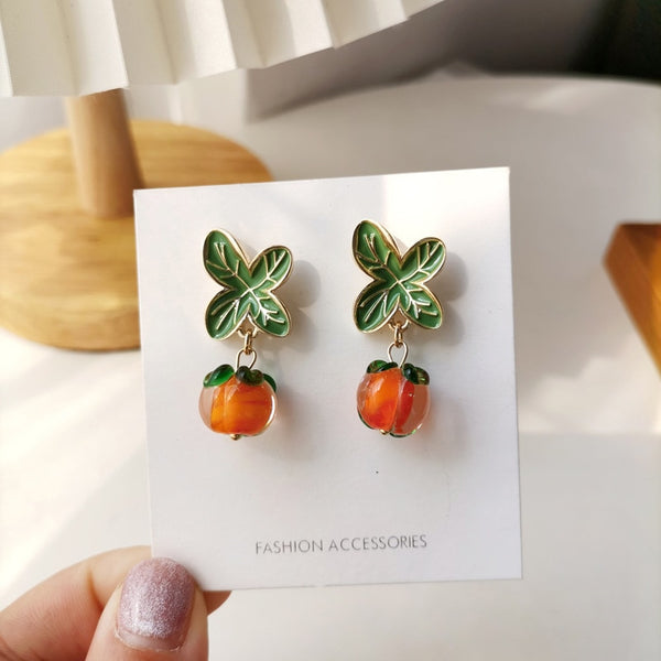 Pendientes de clip de cereza de cristal estilo pastoral de la suerte con caqui de estilo coreano