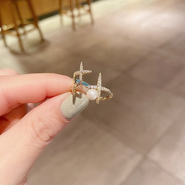 Anillos de apertura con perla en forma de estrella dorada de diseño clásico