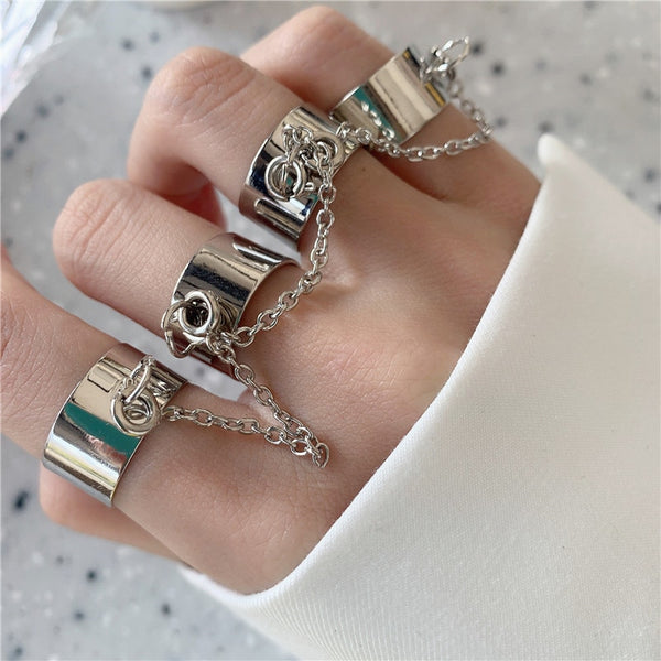 Conjunto de anillos combinados de cadena con apertura gótica