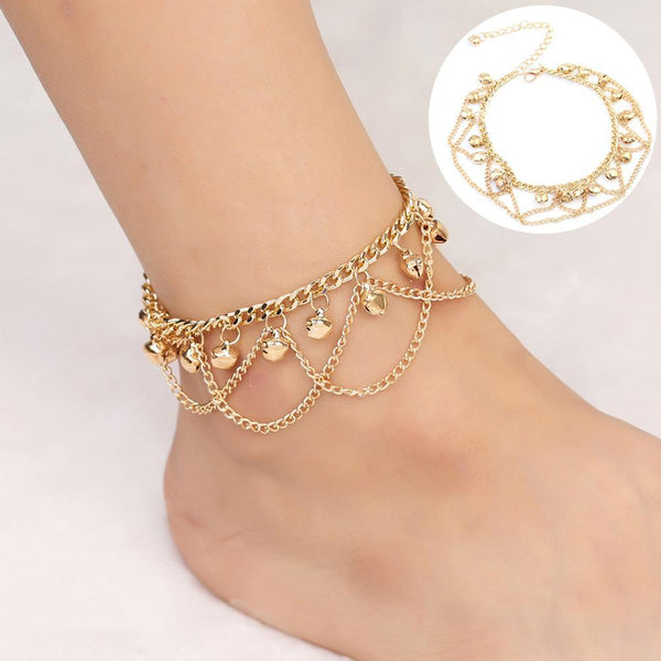 Tobillera con dije de cascabel de moda con cadena cruzada para el pie de playa