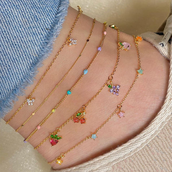 Tobilleras de cristal con forma de mariposa y estrella