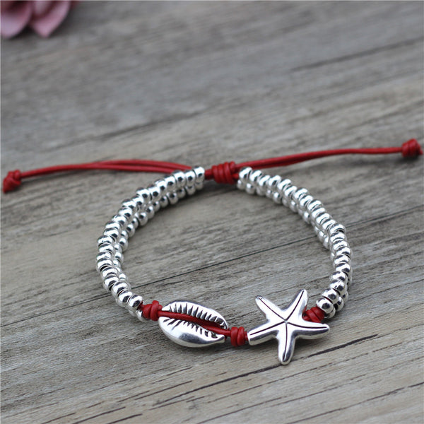 Tobillera de cuero con dijes de concha y estrella de mar para playa y verano