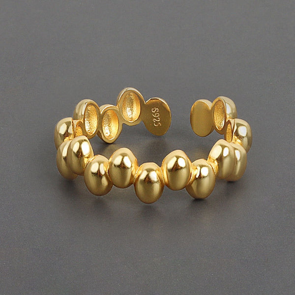 Anillo de lunares geométricos irregulares de color plateado para mujer