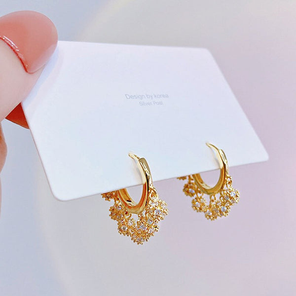 Pendientes exquisitos de circonita AAA con temperamento circular