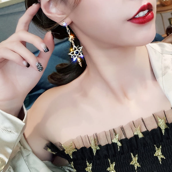 Pendientes largos con forma de estrella y luna, con personalidad