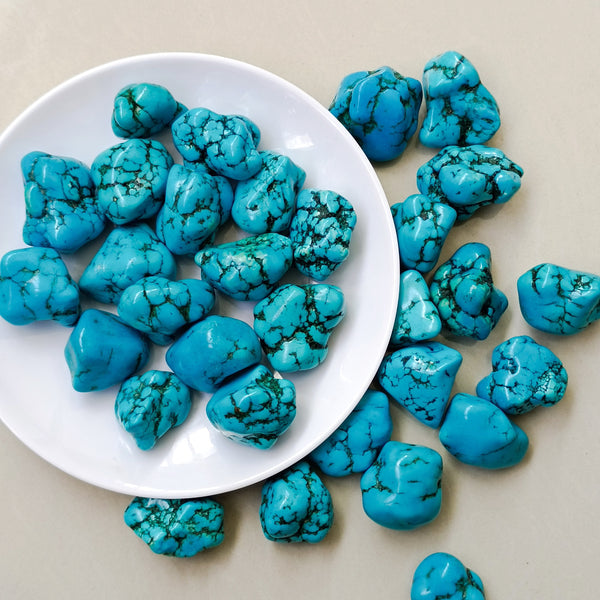 100 g de partículas naturales de color azul turquesa