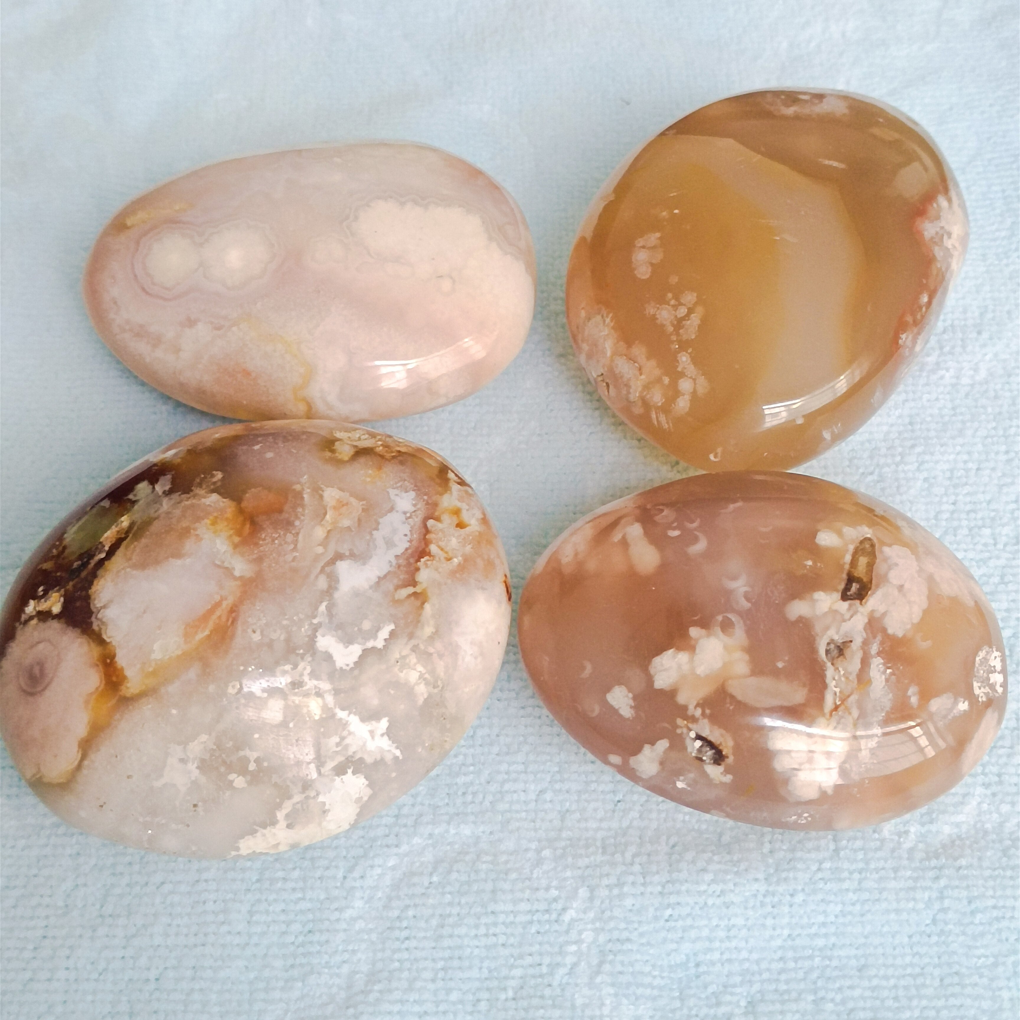 Natural crystal cherry blossom agate palm stone