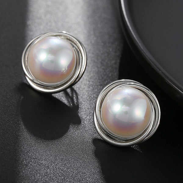 Pendientes de clip de perla Mabe de lujo suave, ideales para mujeres.