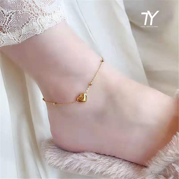 Tobilleras clásicas de acero inoxidable dorado con forma de corazón para mujer