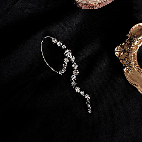 Pendientes coreanos de diamantes de imitación con forma de arco y perforaciones brillantes para colgar en la oreja.
