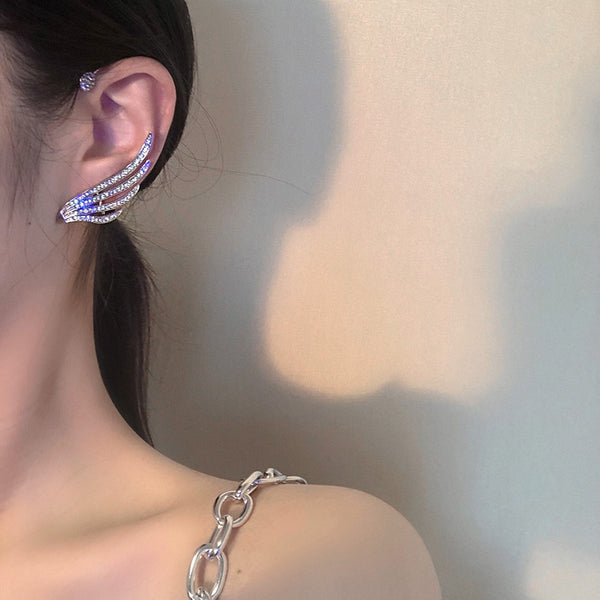 Exquisitos pendientes tipo puño con alas de circonita brillante para mujer