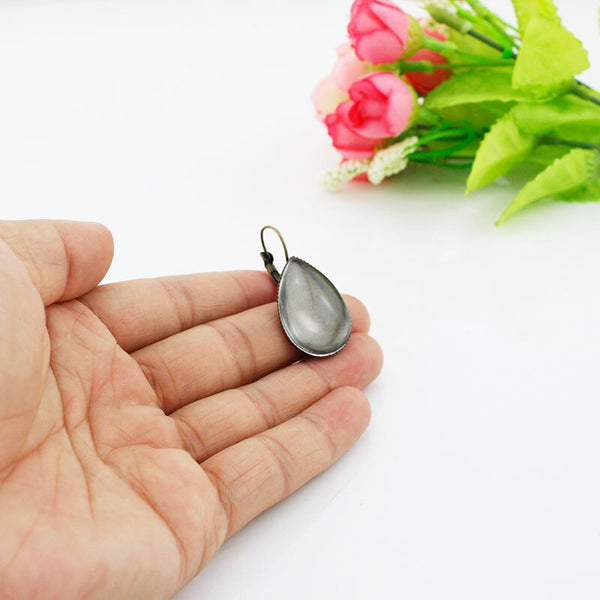 Pendientes de clip con forma de gota de agua y foto de flor de cristal con patrones de arte popular polaco