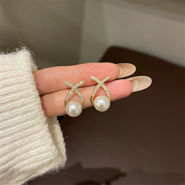 Pendientes de clip con perla y letra X estilo coreano para mujer