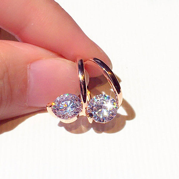 Exquisitos pendientes de diamantes de imitación con dije de destello