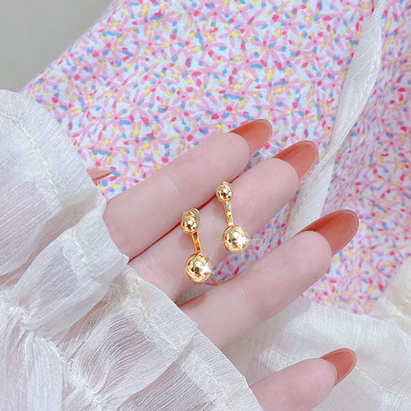 Pendientes minimalistas de oro auténtico de 18 quilates con hebilla y dije para mujer.