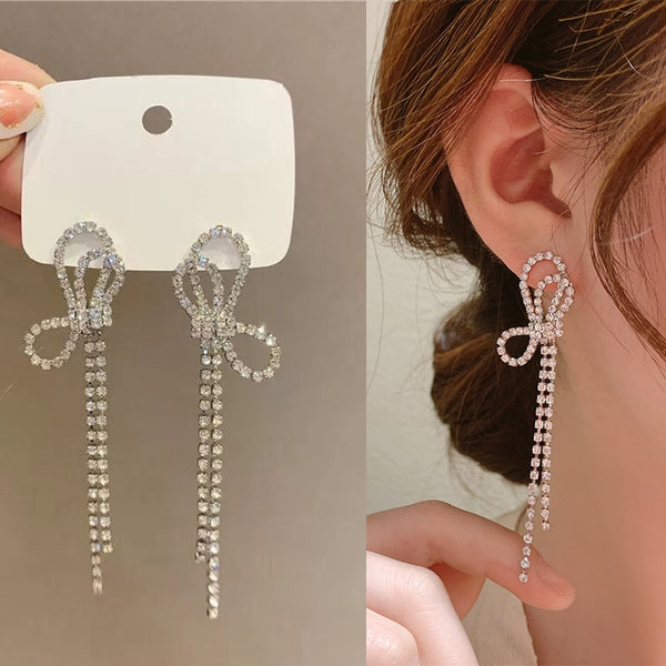 Pendientes de clip con lazo de diamantes de imitación brillantes y temperamento, sin agujero