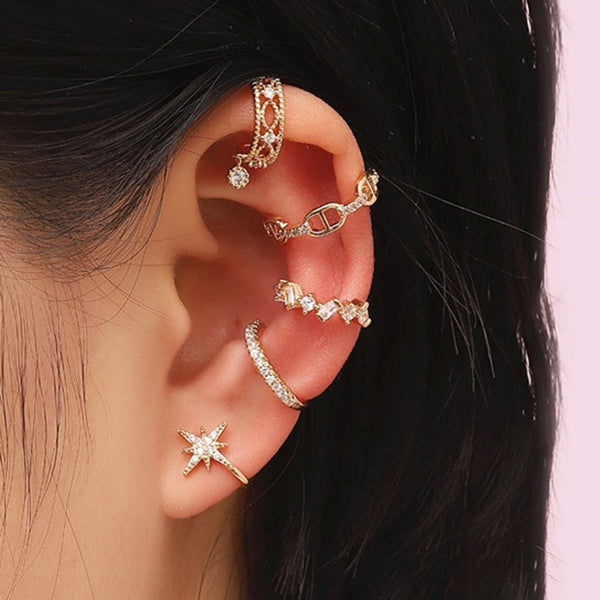 Pendientes de moda con forma de hueso de oreja de circonita y clip minimalista.