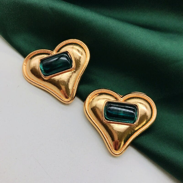 Pendientes de clip con forma de corazón grande, de aleación y piedra verde, con un toque exagerado.