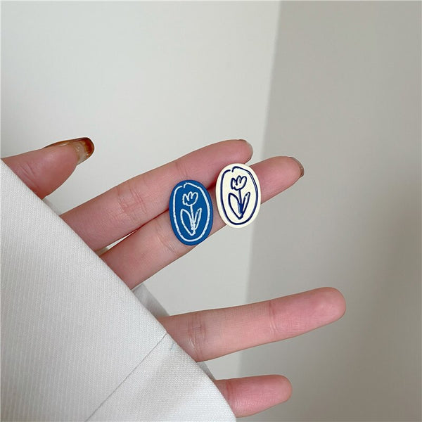 Pendientes coreanos asimétricos de disco redondo geométrico azul y blanco