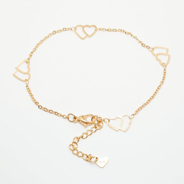 Tobillera de acero inoxidable 304 con cadena de corazón redonda de color dorado.
