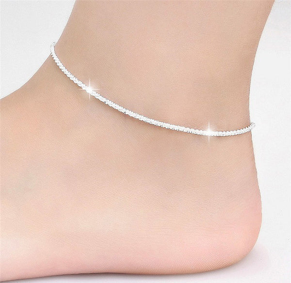 Tobillera fina con cadenas brillantes de color plateado para mujer