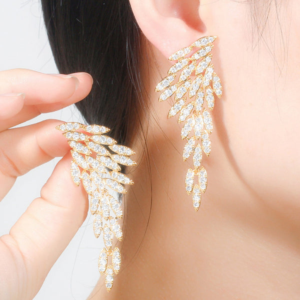 Pendientes largos vintage de circonita cúbica talla marquesa con forma de ala, rellenos de oro 18 quilates