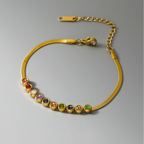 Cadena de serpiente con dijes coloridos de circonitas redondas soldadas de alta gama.
