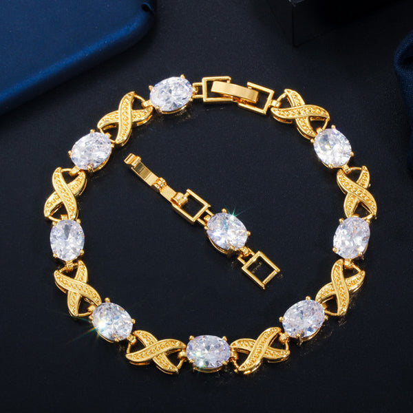 Pulseras de tenis de lujo con cadena de eslabones de oro amarillo y circonitas cúbicas redondas en forma de cruz