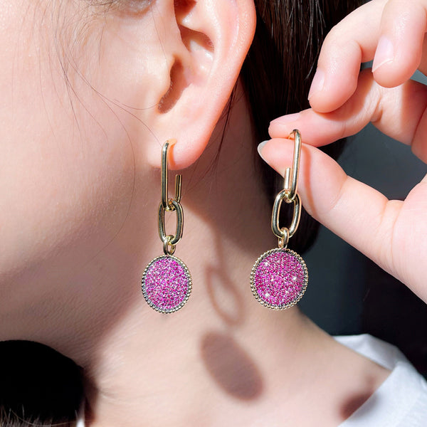Pendientes colgantes redondos con borlas largas doradas y pavé de circonitas cúbicas rosas