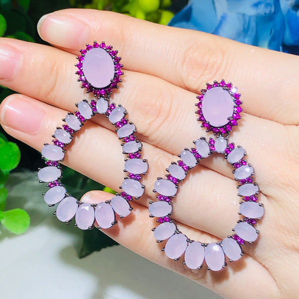 Pendientes con circonita cúbica de corte ovalado en color rosa claro