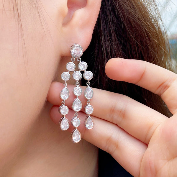 Pendientes largos de plata con forma de gota de agua y forma redonda con engaste de piedra CZ
