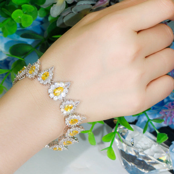 Preciosas pulseras de mano con eslabones de gota de agua y circonita cúbica amarilla para mujer para fiestas