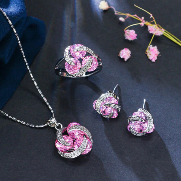 Conjuntos de joyas de diseño giratorio de 4 colores a elegir