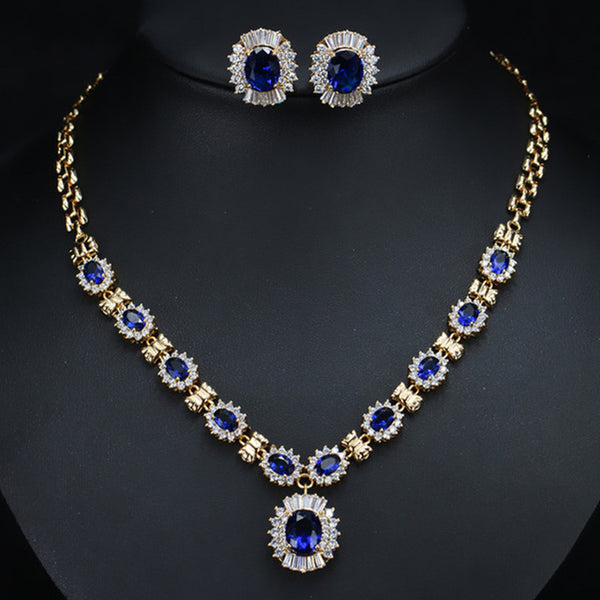 Collar y pendientes de botón con flor redonda de oro indio 585 y circonita azul real