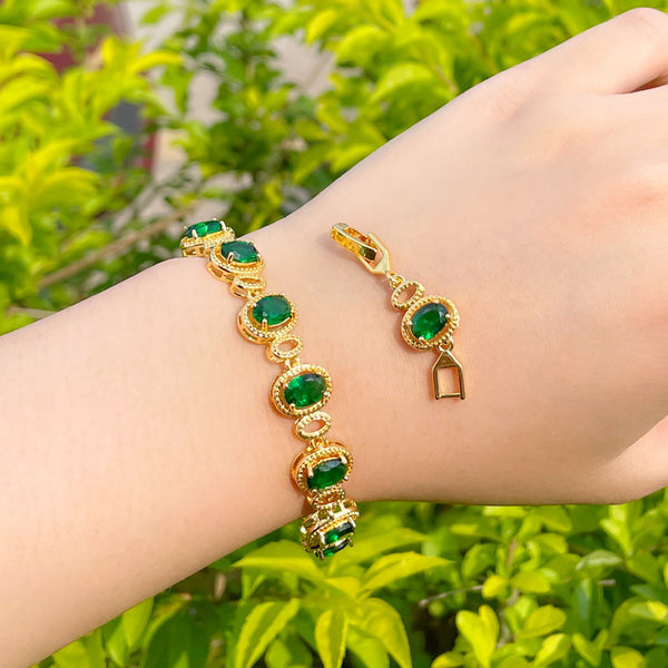 Preciosa pulsera de tenis africana de oro con circonita cúbica y eslabones ovalados verdes