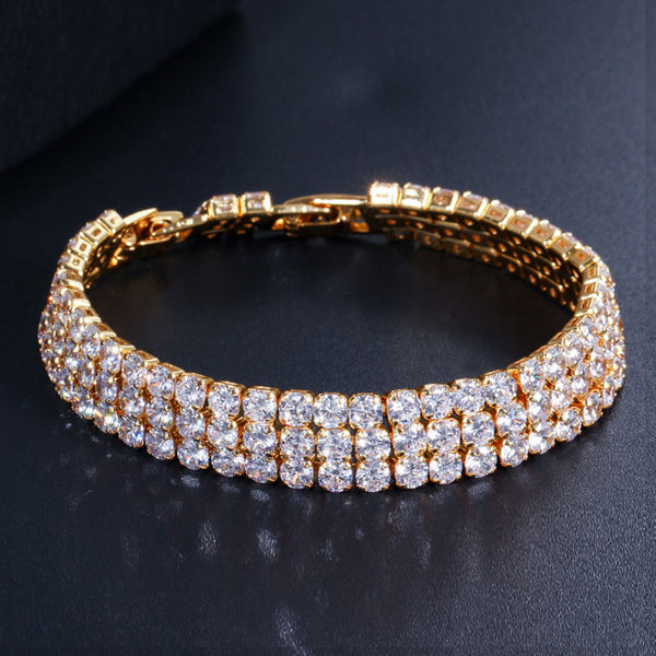 Pulseras grandes redondas de circonita cúbica en oro amarillo para mujer
