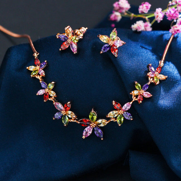 Conjunto de pendientes y collar con circonita cúbica en oro rosa y flores multicolor de estilo coreano.